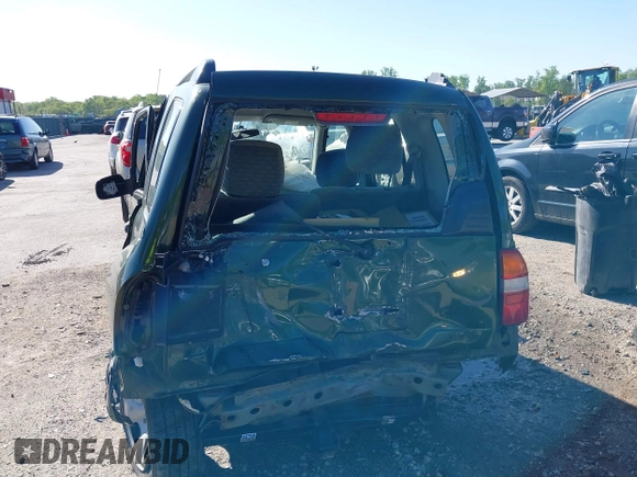 2001 Suzuki Vitara JX z VIN 2S3TD52V416109787, wystawiony jako IAAI lot #42126699 z przebiegiem Nie podano mil oraz . Historia ofert i sprzedaży dostępna na DreamBid. Obrazek 6.