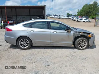 2020 Ford Fusion SE with VIN 3FA6P0LU4LR212740, listed as a IAAI auction lot 42374044 with 146,927 mi miles and . Bid and sale history available at DreamBid. Image 13.