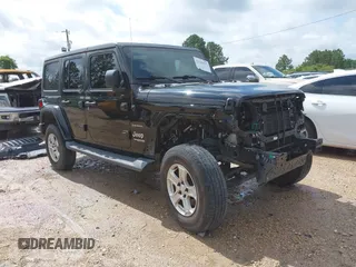 2019 Jeep Wrangler Unlimited Sahara with VIN 1C4HJXEN9KW514880, listed as a IAAI auction lot 42319437 with 70,186 mi miles and . Bid and sale history available at DreamBid. Image 1.