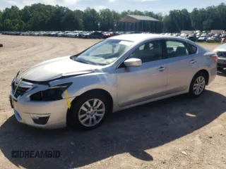 2015 Nissan Altima 2.5 with VIN 1N4AL3AP7FC138558, listed as a Copart auction lot 61197085 with 77,023 mi miles and Salvage title. Bid and sale history available at DreamBid. Image 1.