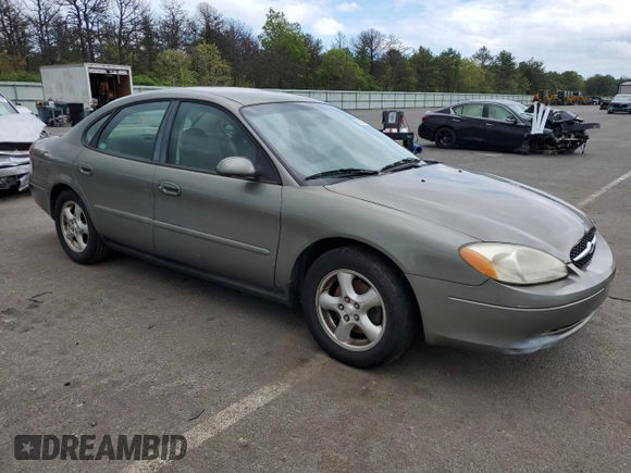 2002 Ford Taurus SE Standard z VIN 1FAFP53U92A246842, wystawiony jako Copart lot #57858765 z przebiegiem 64 545 mil mil oraz Czysty tytuł • Clean title. Historia ofert i sprzedaży dostępna na DreamBid. Obrazek 4.