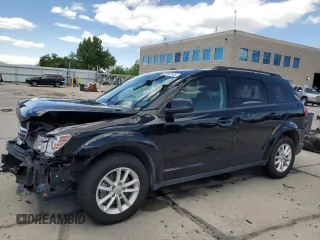 2014 Dodge Journey SXT z VIN 3C4PDDBG5ET192854, wystawiony jako Copart lot #56763145 z przebiegiem 69 143 mil mil oraz Szkoda całkowita • Salvage title. Historia ofert i sprzedaży dostępna na DreamBid. Obrazek 1.