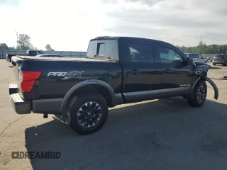 2017 Nissan Titan Platinum Reserve with VIN 1N6AA1E53HN569660, listed as a Copart auction lot 54409625 with 98,858 mi miles and Salvage title. Bid and sale history available at DreamBid. Image 3.
