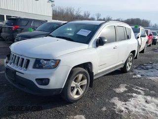 2015 Jeep Compass Sport with VIN 1C4NJDBB7FD214669, listed as a IAAI auction lot 41458343 with 146,374 mi miles and . Bid and sale history available at carsss.com. Image 2.