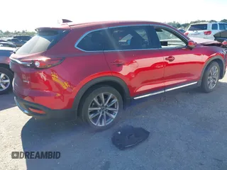 2023 Mazda CX-9 Grand Touring with VIN JM3TCBDY7P0632706, listed as a IAAI auction lot 41003307 with 44,221 mi miles and . Bid and sale history available at carsss.com. Image 4.