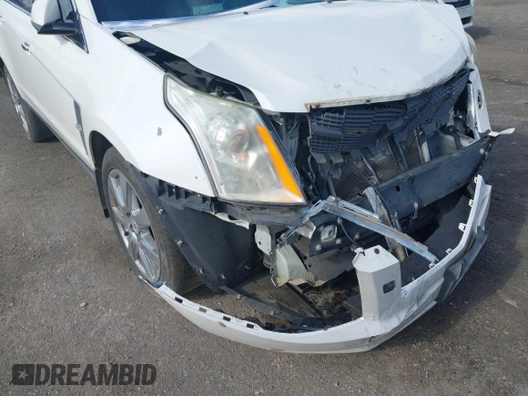 2012 Cadillac SRX Performance Collection with VIN 3GYFNBE34CS659748, listed as a IAAI auction lot 42693814 with 216,854 mi miles and . Bid and sale history available at DreamBid. Image 12.