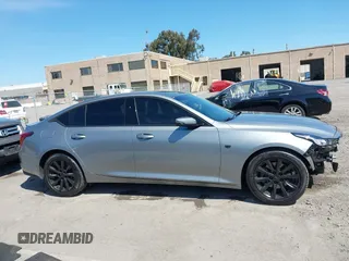 2023 Cadillac CT5 Luxury z VIN 1G6DW5RK7P0146345, wystawiony jako IAAI lot #41862152 z przebiegiem 18 902 mil mil oraz . Historia ofert i sprzedaży dostępna na DreamBid. Obrazek 14.