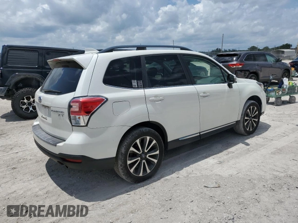 2017 Subaru Forester Touring with VIN JF2SJGWC2HH594766, listed as a Copart auction lot 50199083 with 51,189 mi miles and . Bid and sale history available at DreamBid. Image 3.