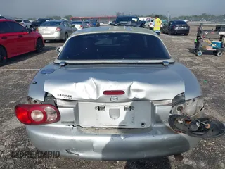 2003 Mazda MX-5 Miata Cloth with VIN JM1NB353730311899, listed as a IAAI auction lot 41929811 with 99,589 mi miles and . Bid and sale history available at DreamBid. Image 16.