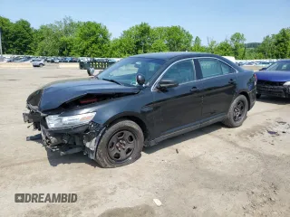 2013 Ford Police Interceptor with VIN 1FAHP2M82DG184726, listed as a Copart auction lot 59620645 with 140,874 mi miles and Salvage title. Bid and sale history available at DreamBid. Image 1.