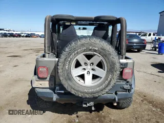 2006 Jeep Wrangler Rubicon with VIN 1J4FA69S36P744801, listed as a Copart auction lot 46541575 with 164,347 mi miles and Salvage title. Bid and sale history available at DreamBid. Image 6.