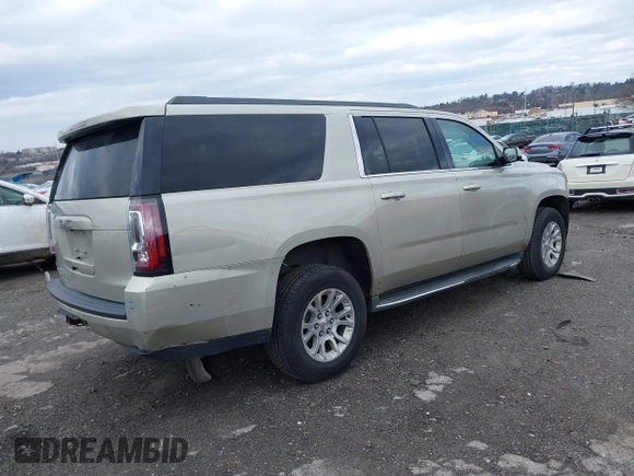 2015 GMC Yukon XL SLT with VIN 1GKS2HKC7FR100534, listed as a IAAI auction lot 41229658 with 207,947 mi miles. Bid and sale history available at carsss.com. Image 4.