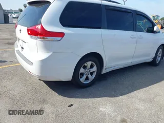 2011 Toyota Sienna LE AAS with VIN 5TDKK3DC1BS040029, listed as a IAAI auction lot 42087897 with 132,843 mi miles. Bid and sale history available at carsss.com. Image 4.