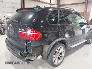 2012 BMW X5 50i with VIN 5UXZV8C50CL425721, listed as a IAAI auction lot 42590676 with 192,355 mi miles and . Bid and sale history available at DreamBid. Image 6.