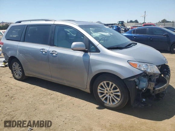 2012 Toyota Sienna XLE AAS with VIN 5TDYK3DC1CS204598, listed as a Copart auction lot 62293015 with 76,108 mi miles and Salvage title. Bid and sale history available at DreamBid. Image 4.