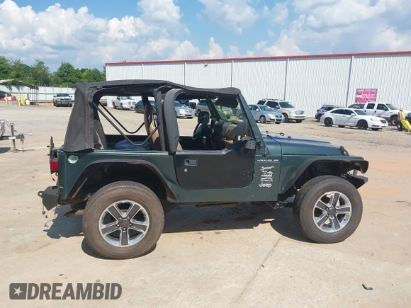 2002 Jeep Wrangler Sport with VIN 1J4FA49S52P760173, listed as a IAAI auction lot 42468550 with 201,682 mi miles and . Bid and sale history available at DreamBid. Image 13.