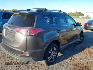 2017 Toyota RAV4 LE with VIN 2T3ZFREV0HW354624, listed as a IAAI auction lot 41851021 with 66,174 mi miles and . Bid and sale history available at carsss.com. Image 4.