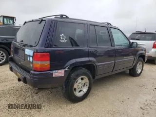1998 Jeep Grand Cherokee with VIN 1J4FX48S1WC244308, listed as a Copart auction lot 74384714 with Not provided miles and Non repairable. Bid and sale history available at DreamBid. Image 3.
