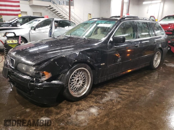 2003 BMW 5 Series 525iAT with VIN WBADS43443GE11057, listed as a Copart auction lot 44243155 with 174,926 mi miles and Salvage Title. Bid and sale history available at carsss.com. Image 1.