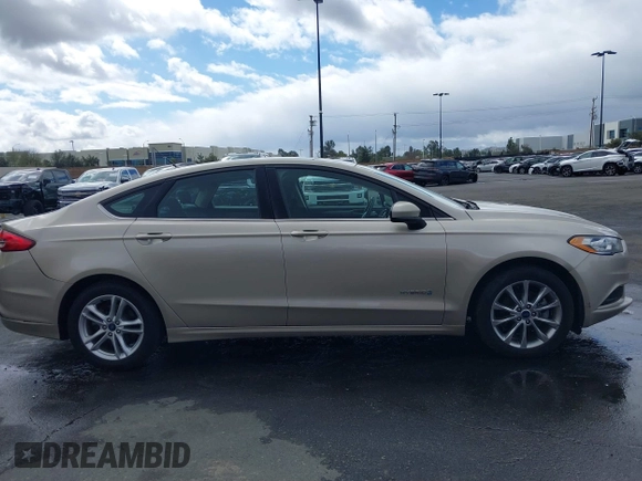2017 Ford Fusion Hybrid SE with VIN 3FA6P0LU0HR355269, listed as a IAAI auction lot 41745299 with 97,675 mi miles and . Bid and sale history available at DreamBid. Image 13.