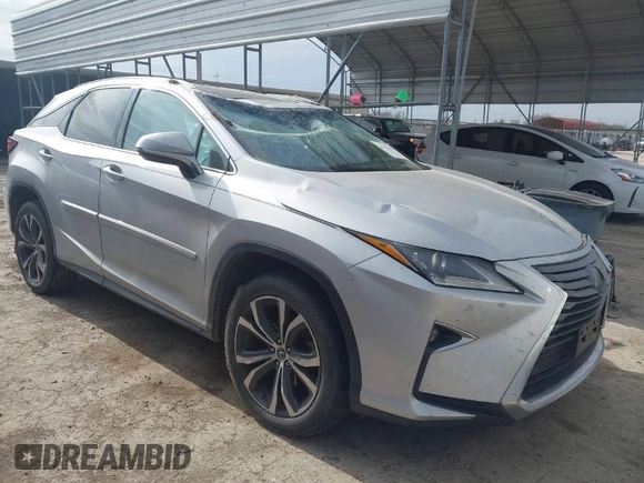 2019 Lexus RX with VIN 2T2ZZMCA3KC135292, listed as a IAAI auction lot 41573153 with 106,971 mi miles. Bid and sale history available at carsss.com. Image 1.