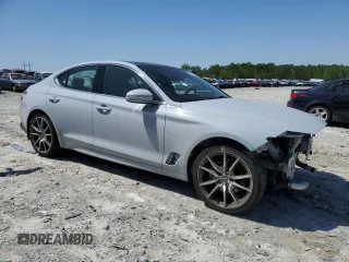 2022 Genesis G70 2.0T z VIN KMTG34TA0NU089619, wystawiony jako Copart lot #52154495 z przebiegiem 70 890 mil mil oraz Szkody całkowita. Historia ofert i sprzedaży dostępna na DreamBid. Obrazek 4.