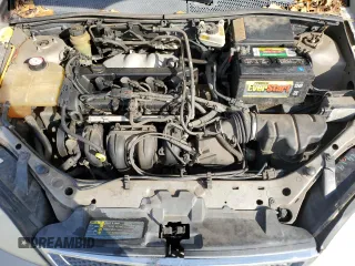 2005 Ford Focus S with VIN 1FAFP34N35W141023, listed as a Copart auction lot 84230574 with 244,545 mi miles and Salvage Title. Bid and sale history available at carsss.com. Image 12.