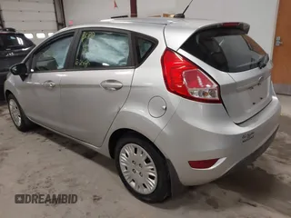 2015 Ford Fiesta S z VIN 3FADP4TJ7FM220448, wystawiony jako IAAI lot #41688114 z przebiegiem 43 779 mil mil oraz . Historia ofert i sprzedaży dostępna na DreamBid. Obrazek 3.