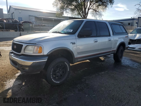 2002 Ford F-150 XLT with VIN 1FTRW08L12KA86849, listed as a Copart auction lot 77861574 with 0 mi miles and Salvage Title. Bid and sale history available at carsss.com. Image 1.