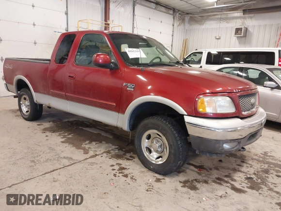 2003 Ford F-150 XL with VIN 1FTRX18L33NB82694, listed as a IAAI auction lot 41612431 with 179,664 mi miles. Bid and sale history available at carsss.com. Image 1.