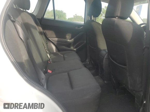 2016 Mazda CX-5 Sport with VIN JM3KE2BY0G0729349, listed as a Copart auction lot 62469735 with 88,247 mi miles and Salvage title. Bid and sale history available at DreamBid. Image 11.