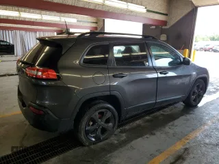 2017 Jeep Cherokee Sport with VIN 1C4PJLAB2HW623738, listed as a Copart auction lot 61817915 with 131,022 mi miles and Salvage title. Bid and sale history available at DreamBid. Image 3.