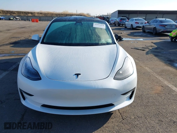 2023 Tesla Model 3 with VIN 5YJ3E1EA2PF582331, listed as a IAAI auction lot 41043858 with 33,601 mi miles and . Bid and sale history available at DreamBid. Image 12.
