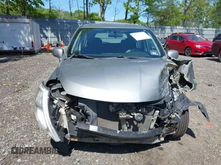 2009 Nissan Versa SL with VIN 3N1BC13E39L383013, listed as a IAAI auction lot 42271316 with 148,279 mi miles and . Bid and sale history available at DreamBid. Image 12.