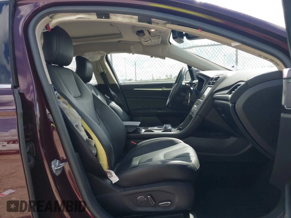 2017 Ford Fusion Titanium with VIN 3FA6P0K97HR214485, listed as a IAAI auction lot 40208619 with 39,265 mi miles and . Bid and sale history available at DreamBid. Image 5.