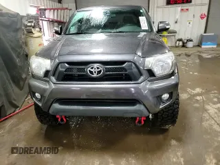 2014 Toyota Tacoma with VIN 5TFLU4ENXEX089927, listed as a Copart auction lot 52140565 with 112,924 mi miles and Salvage Title. Bid and sale history available at DreamBid. Image 13.