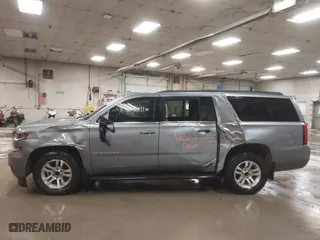 2019 Chevrolet Suburban LT with VIN 1GNSKHKC3KR195042, listed as a IAAI auction lot 41704591 with 107,166 mi miles. Bid and sale history available at carsss.com. Image 14.