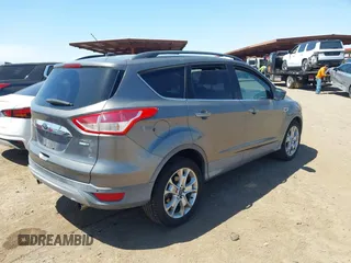 2013 Ford Escape SEL with VIN 1FMCU9H92DUB31689, listed as a IAAI auction lot 42022387 with 74,343 mi miles. Bid and sale history available at carsss.com. Image 4.