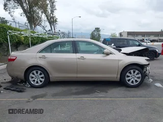 2009 Toyota Camry with VIN 4T4BE46K19R092530, listed as a IAAI auction lot 42051158 with 135,875 mi miles. Bid and sale history available at carsss.com. Image 14.