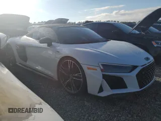 2021 Audi R8 Spyder performance z VIN WUA4BCFX5M7901463, wystawiony jako Copart lot #73882684 z przebiegiem Nie podano mil oraz Szkody całkowita. Historia ofert i sprzedaży dostępna na DreamBid. Obrazek 4.