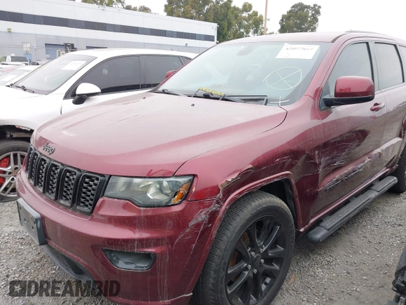 2018 Jeep Grand Cherokee Altitude with VIN 1C4RJEAG0JC433654, listed as a IAAI auction lot 42057867 with 103,552 mi miles and . Bid and sale history available at DreamBid. Image 2.