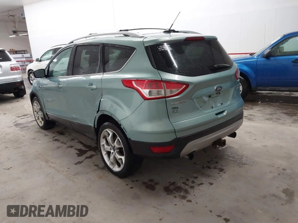 2013 Ford Escape Titanium with VIN 1FMCU9J9XDUC60029, listed as a IAAI auction lot 41936948 with 184,012 mi miles and . Bid and sale history available at DreamBid. Image 3.