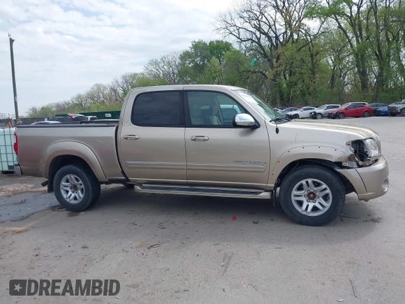 2004 Toyota Tundra SR5 with VIN 5TBET34154S453236, listed as a IAAI auction lot 42034322 with 209,028 mi miles and . Bid and sale history available at carsss.com. Image 13.