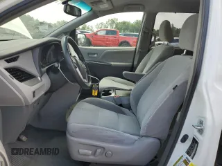 2017 Toyota Sienna LE with VIN 5TDJZ3DC3HS171060, listed as a Copart auction lot 65908415 with 108,082 mi miles and Salvage title. Bid and sale history available at DreamBid. Image 7.