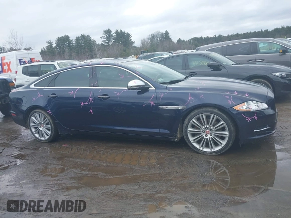 2015 Jaguar XJ Portfolio with VIN SAJWJ2GD0F8V83497, listed as a IAAI auction lot 41697285 with 52,311 mi miles and . Bid and sale history available at DreamBid. Image 13.