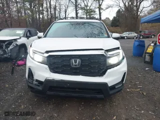 2023 Honda Passport EX-L with VIN 5FNYF8H55PB035483, listed as a IAAI auction lot 40960900 with 16,777 mi miles. Bid and sale history available at carsss.com. Image 6.
