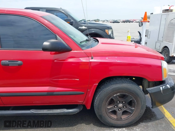 2005 Dodge Dakota SLT z VIN 1D7HE48N65S209630, wystawiony jako IAAI lot #42409822 z przebiegiem 224 849 mil mil oraz . Historia ofert i sprzedaży dostępna na DreamBid. Obrazek 12.