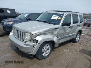 2009 Jeep Liberty Sport with VIN 1J8GN28K69W512320, listed as a IAAI auction lot 41970015 with 115,443 mi miles. Bid and sale history available at carsss.com. Image 2.