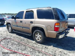 2003 Chevrolet Tahoe LT with VIN 1GNEC13Z33R190168, listed as a IAAI auction lot 41858522 with 359,289 mi miles. Bid and sale history available at carsss.com. Image 3.