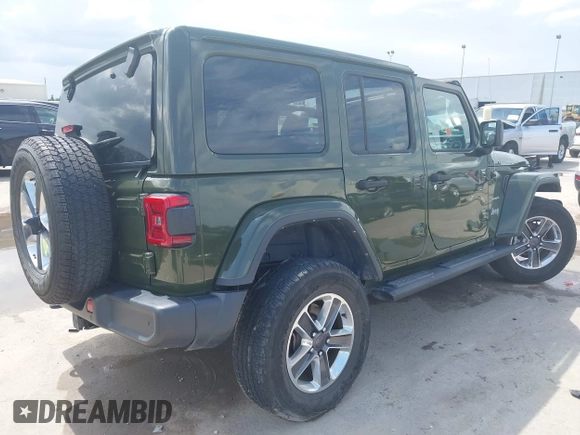 2022 Jeep Wrangler Unlimited Sahara Altitude with VIN 1C4HJXEG3NW194042, listed as a IAAI auction lot 42643314 with 32,091 mi miles and . Bid and sale history available at DreamBid. Image 4.